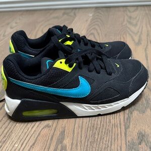 Nike Kids Black Sneakers with Blue Swoosh and Neon Yellow Accents